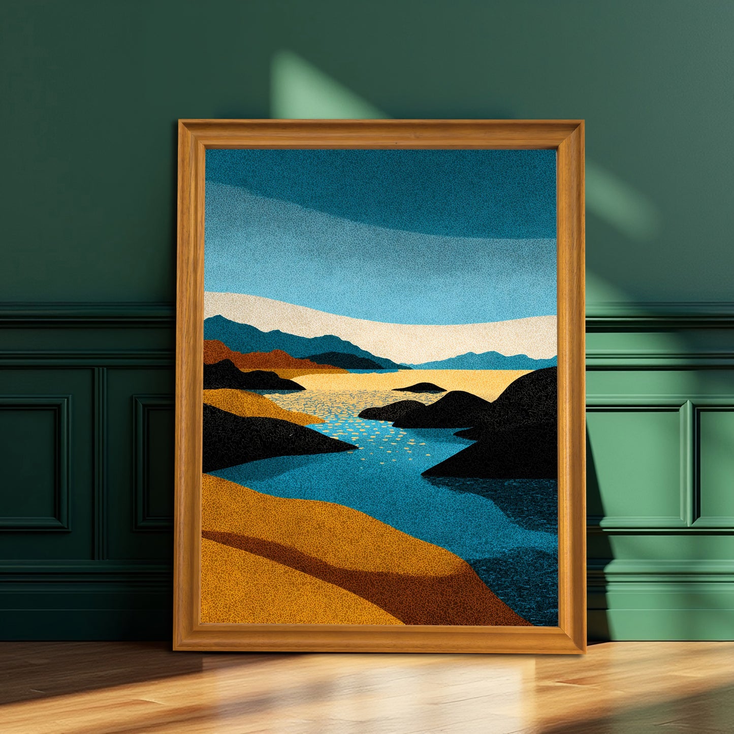 Vertical abstract stippled landscape art print in a warm natural brown wood frame, resting on a wooden floor against a dark emerald green paneled wall.