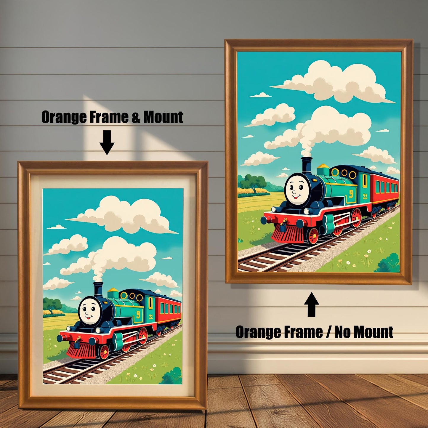 Two versions of the train art print, framed in orange, against a wooden wall. The print on the left has a mount, while the one on the right does not. Labels "Orange Frame & Mount" and "Orange Frame / No Mount" describe the options.
