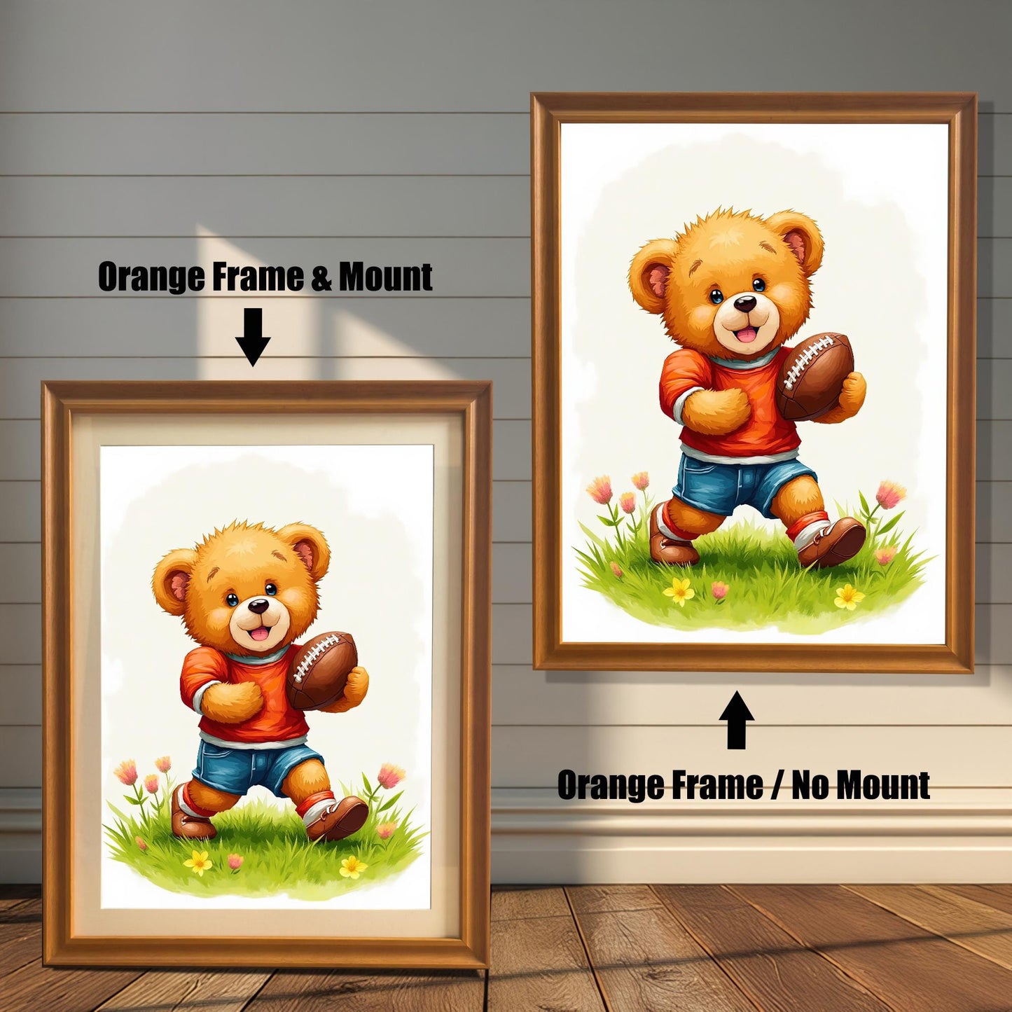 Two framed art prints of a cute teddy bear playing football. The print on the left is in an orange wood frame with a white mount, and the right is in an orange wood frame with no mount. The prints are against a rustic wood wall background.