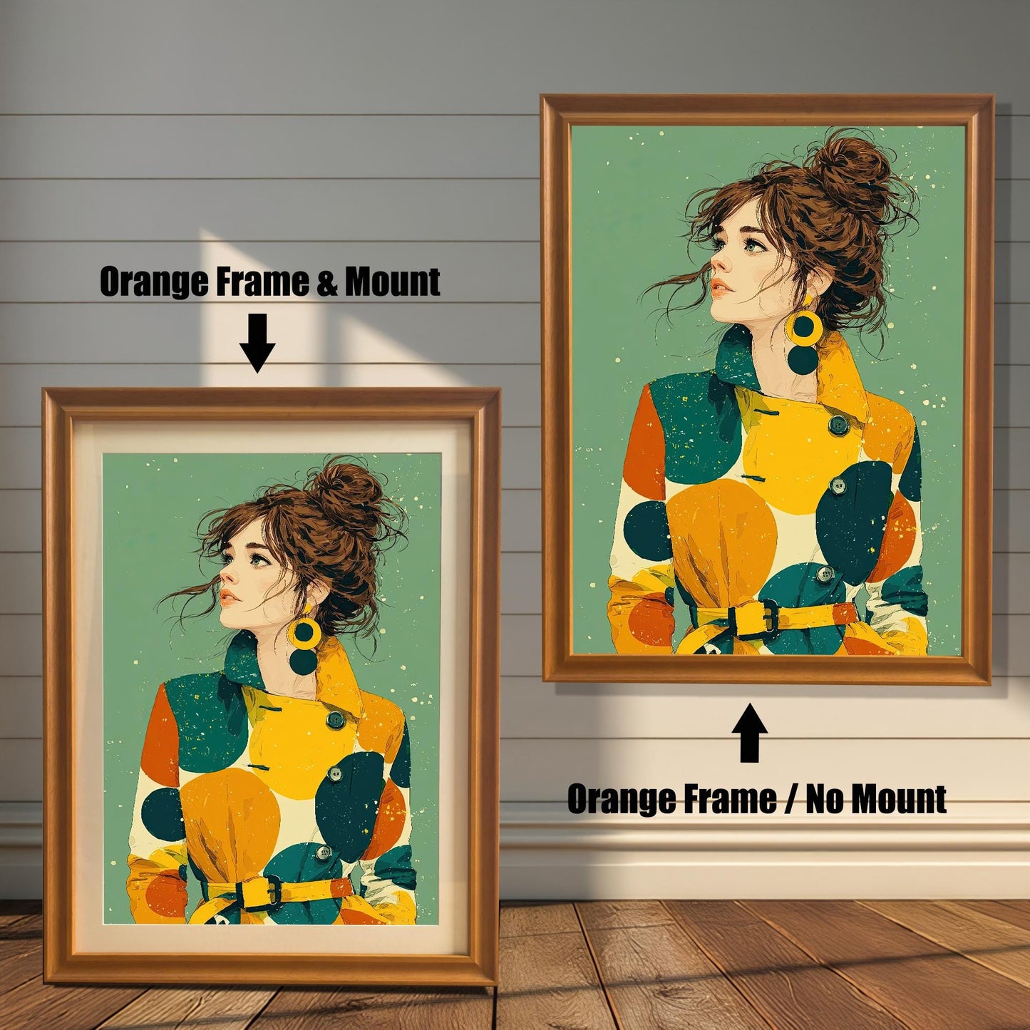 Two framed art prints on a wood floor against a white wall. The left has an orange frame with a mount, and the right has an orange frame without a mount. Both feature a portrait of a woman in a colorful coat.