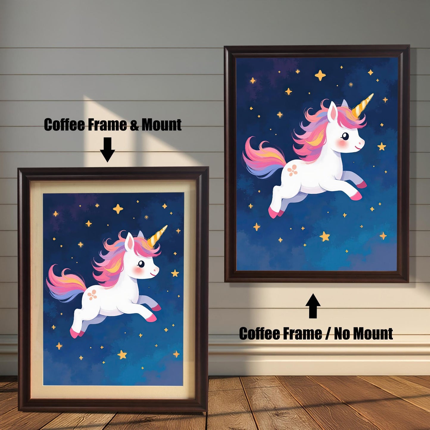 Two versions of a cute unicorn wall art print with a coffee-colored wood frame. The print on the left is a smaller size framed with a white mount (or mat), and the one on the right is a larger size without a mount. The image shows the framed prints against a white paneled wall.