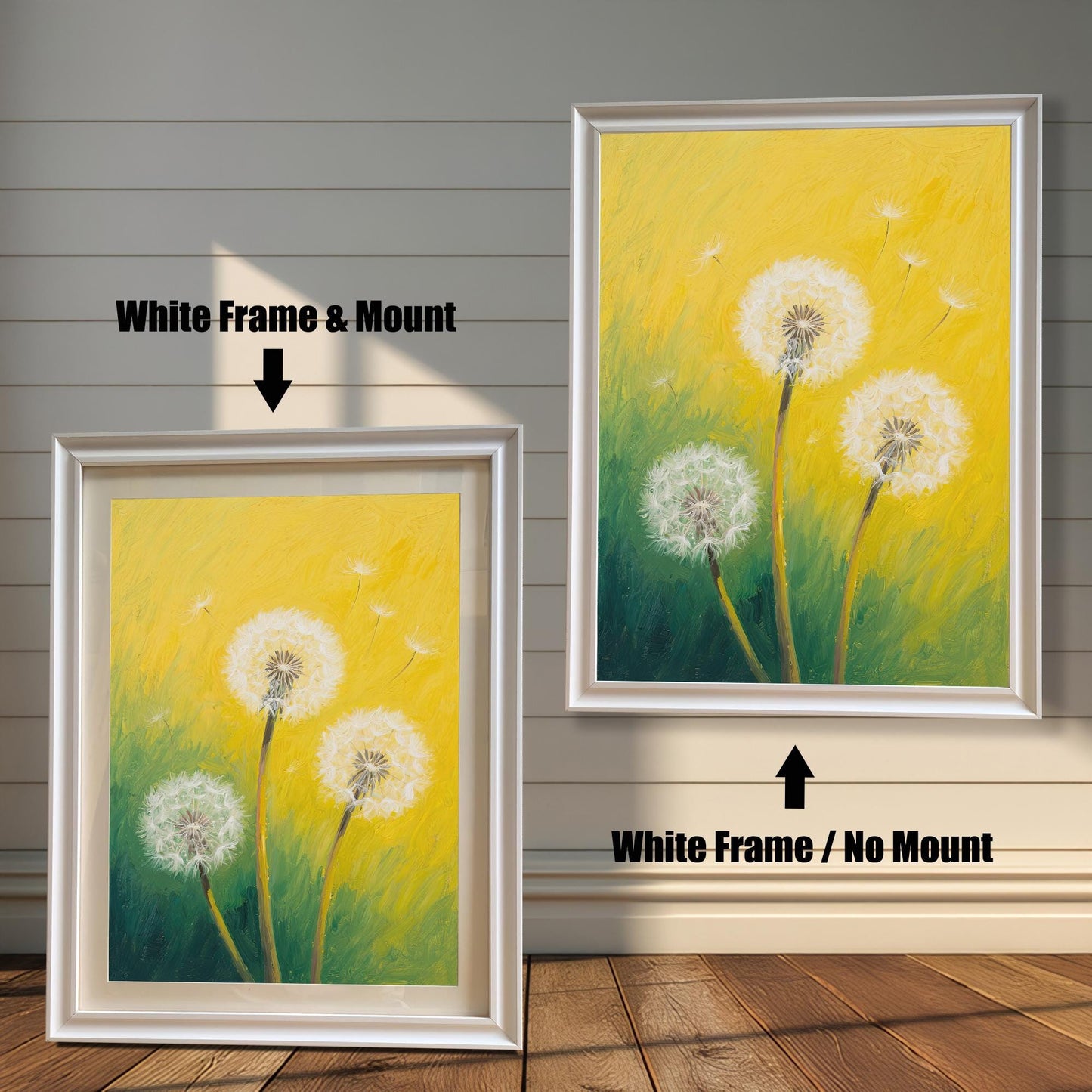 Two framed dandelion art prints on a wood paneled wall. One has a white frame with a mount, and the other is the same frame without a mount.