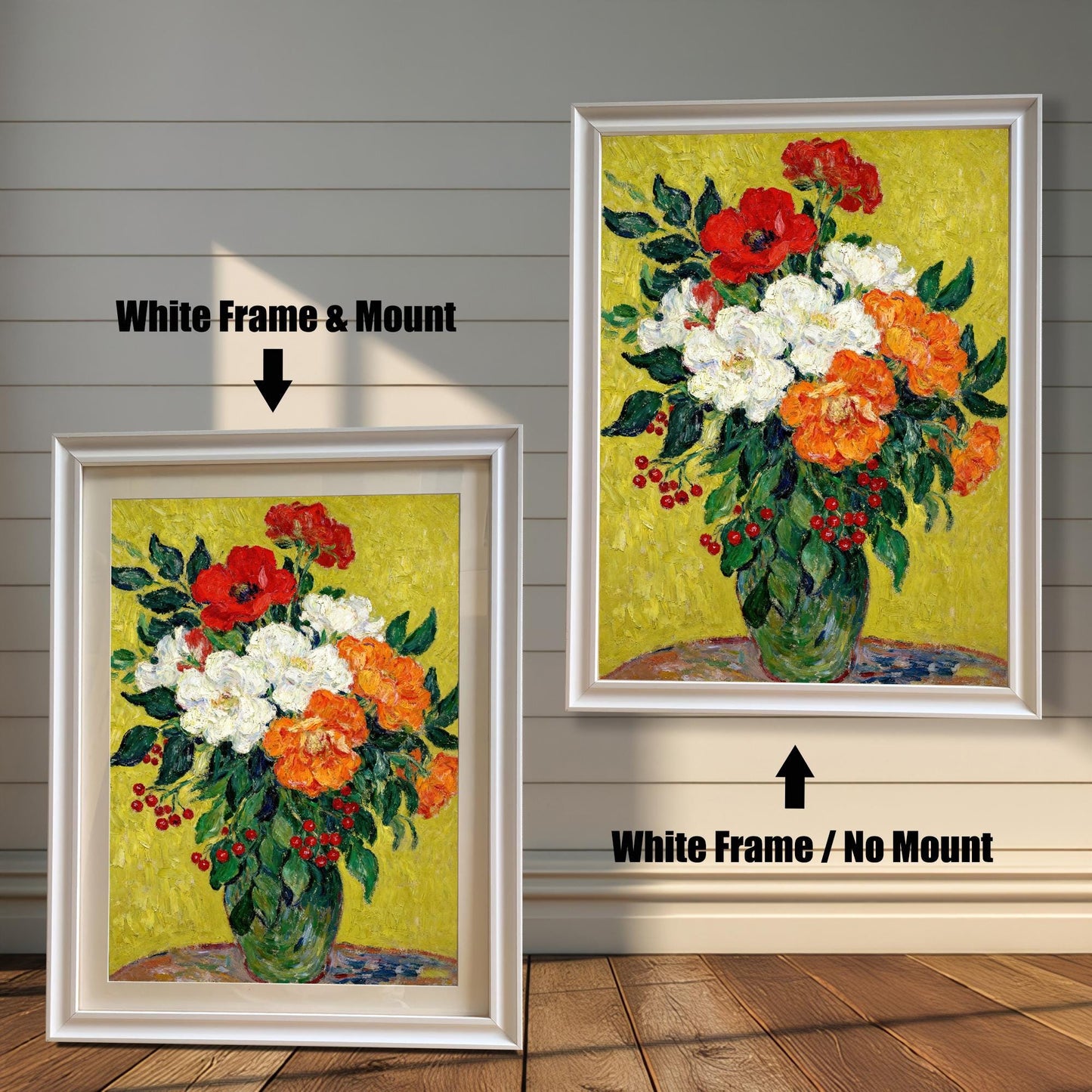 A painting of red, white, and orange flowers in a white frame, shown with and without a white mat, displayed against a rustic wood-paneled wall.