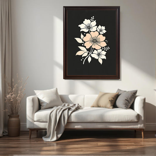 A framed floral art print with a coffee-colored frame hanging on a wall above a white sofa with pillows and a throw blanket.