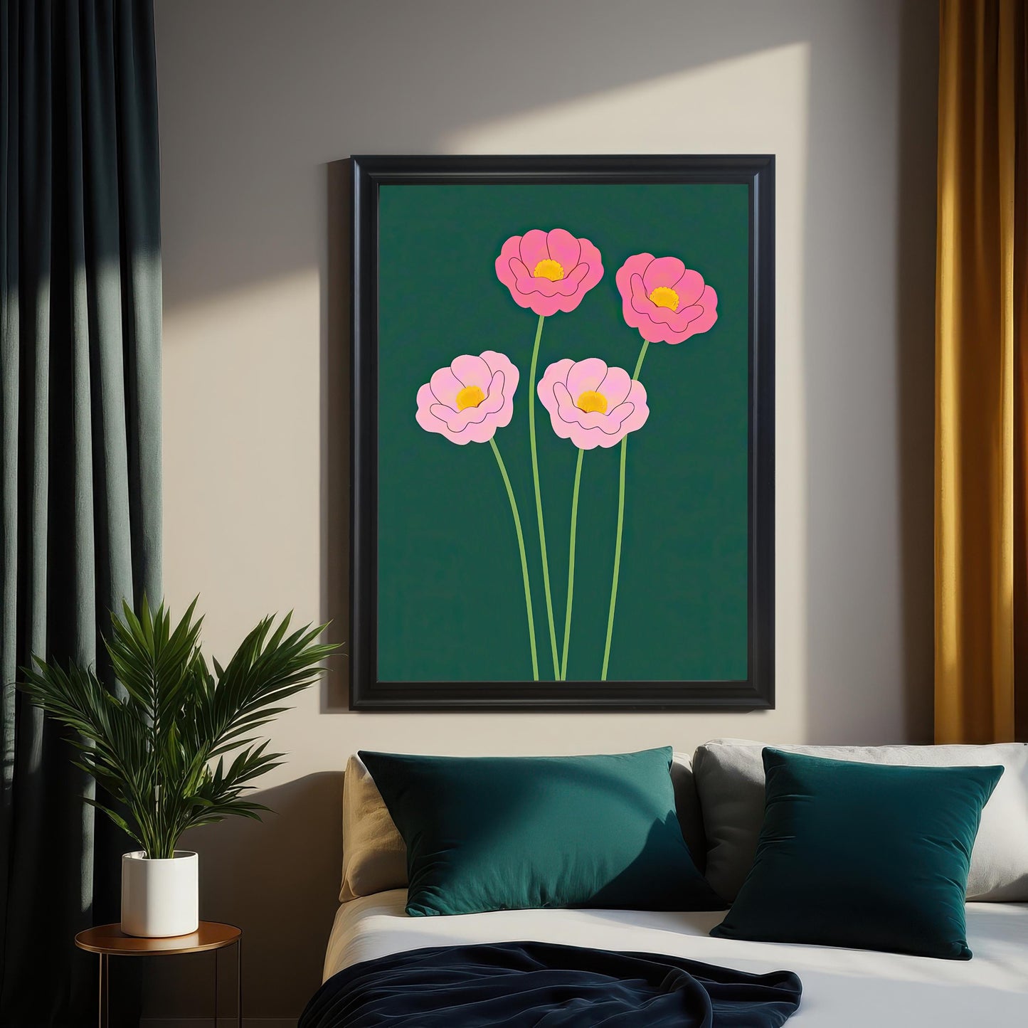 The art print featuring four stylized pink flowers on a dark forest green background, displayed in a Black Frame. The print is hung above a bed with dark teal pillows and is flanked by dark green and gold curtains, with a potted plant on a side table.