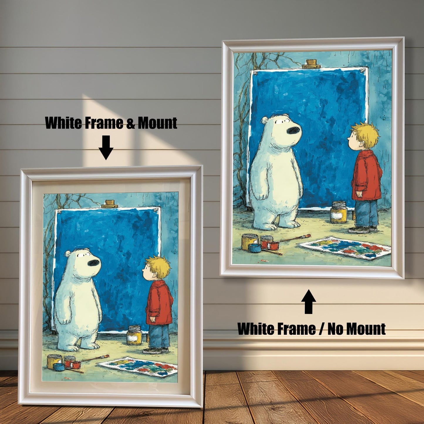 A split image showing an illustration of a polar bear and a small boy looking at a large blue canvas. On the left, the print is displayed in a White Frame & Mount (with a light border around the print). On the right, the print is shown in a White Frame / No Mount.