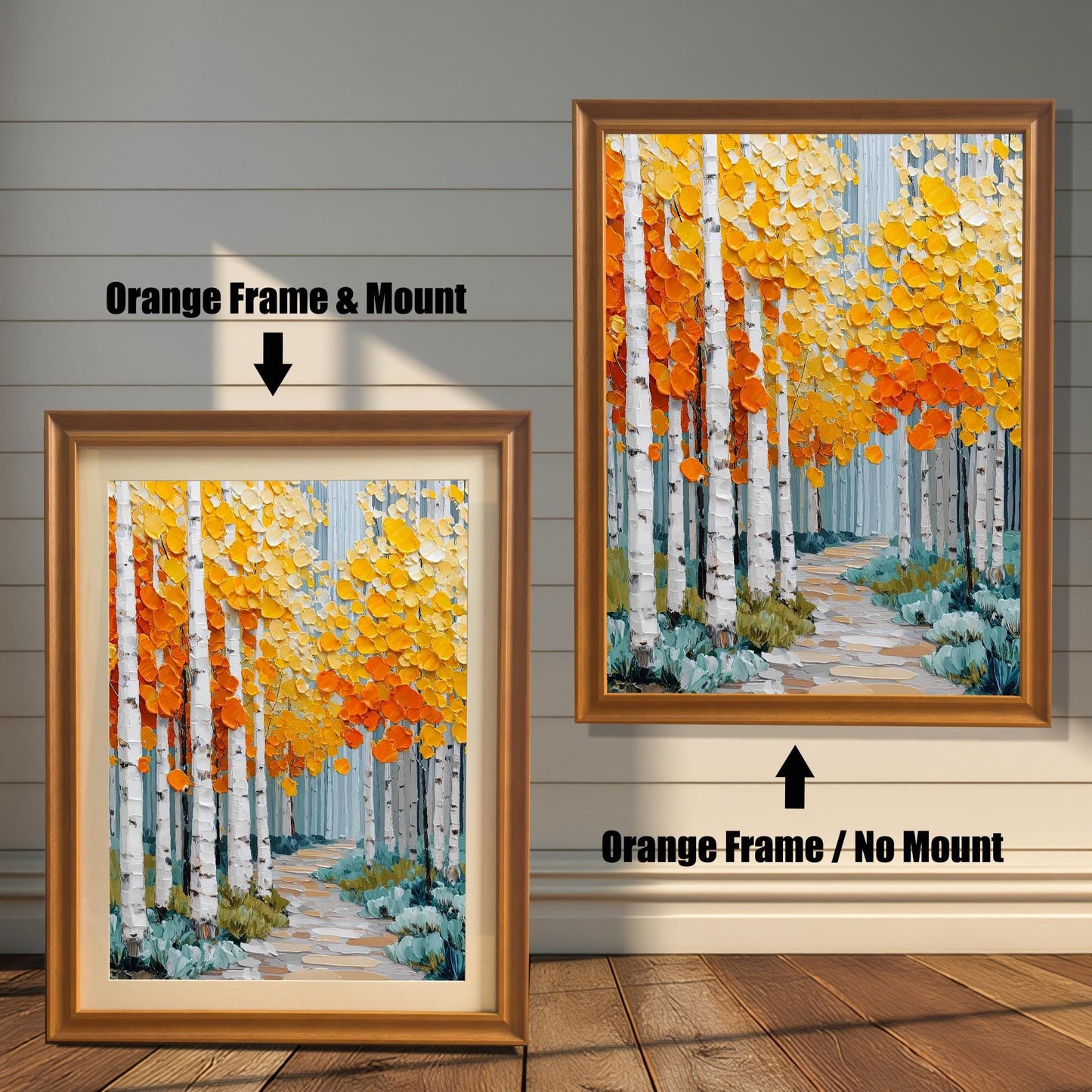 Two versions of a vibrant impasto print of an aspen forest with a path, against a rustic wooden wall. The left print is in an Orange (light brown/gold) frame and includes a light-colored mount (mat). The right print is in an Orange frame with no mount.