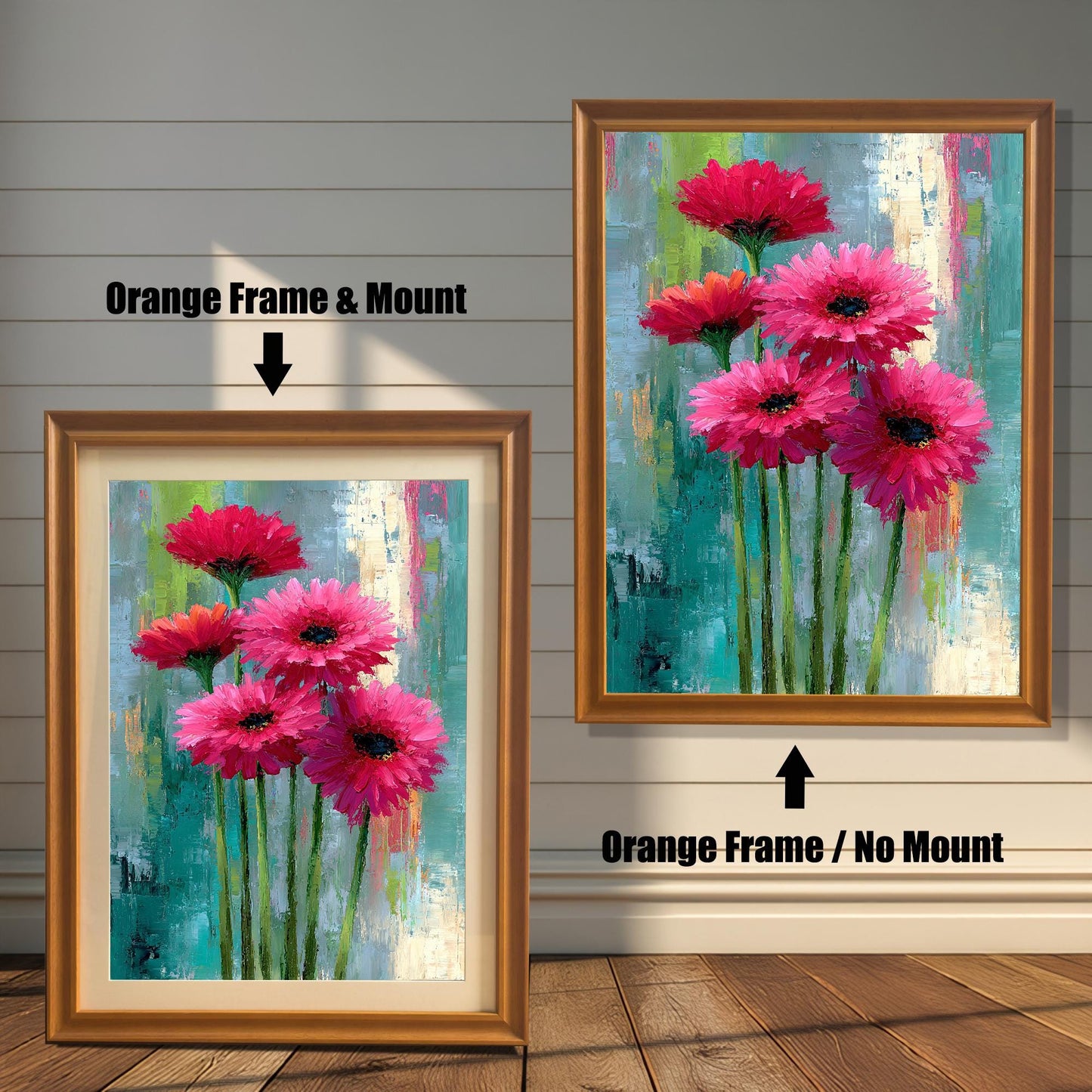 Abstract floral painting of bright pink flowers in two options: an Orange Frame & Mount (with a light border/mat) on the left, and an Orange Frame / No Mount (full print to the frame edge) on the right. Both hang on a wood-paneled wall.