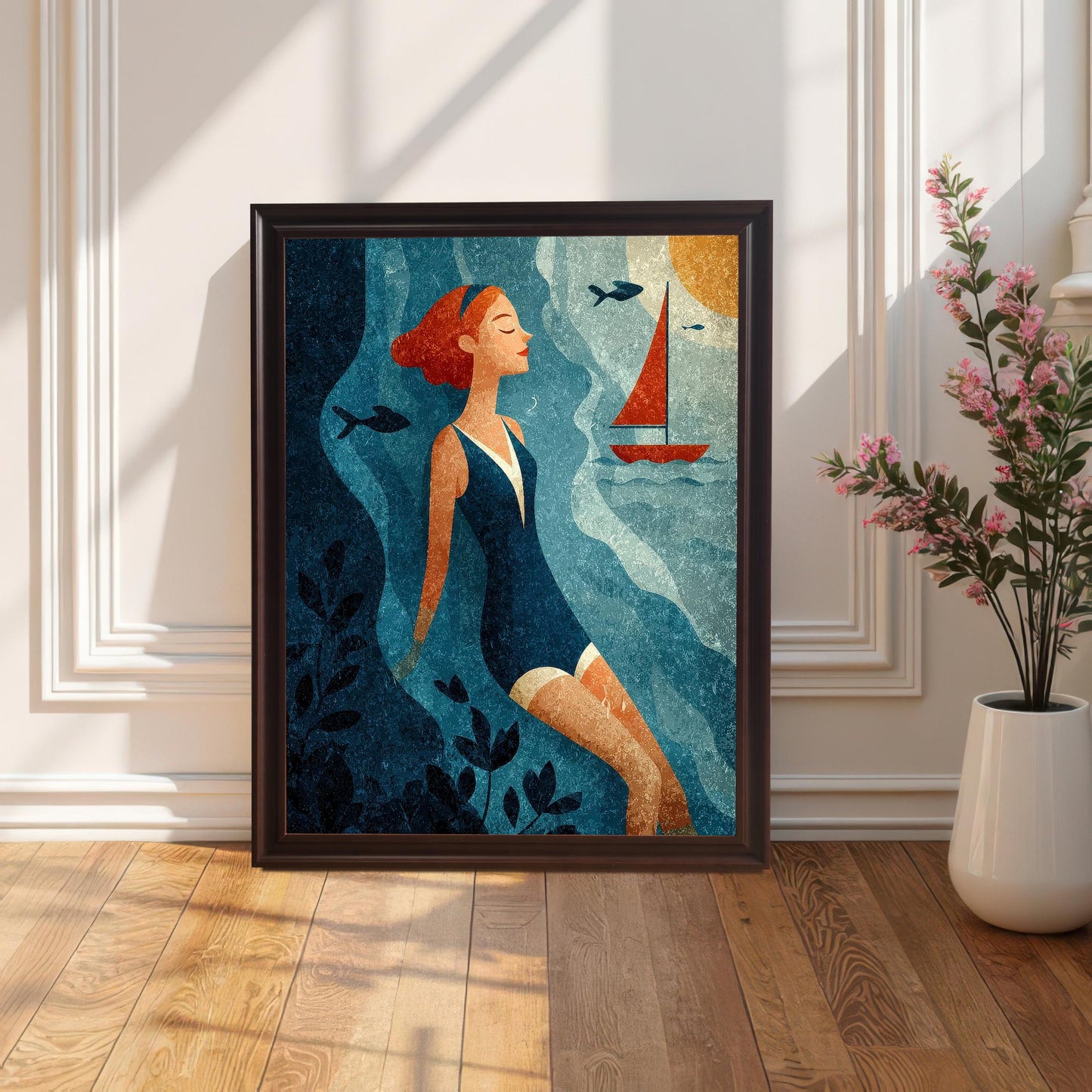 A framed art print of the swimmer in a blue swimsuit, set in a Coffee/Dark Brown Frame (no mount), propped on a hardwood floor against a white paneled wall. Sunlight casts strong, angular shadows across the floor, and a potted pink flowering plant is visible on the right.