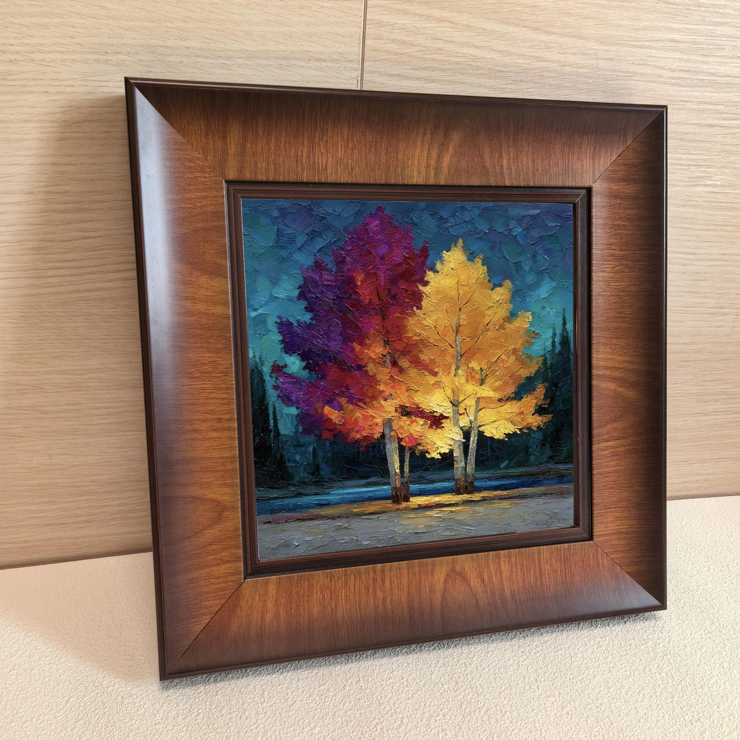 Angled side view of a thick walnut-finish square frame leaning against a light wood wall, highlighting the grain and high-quality mitered corners.