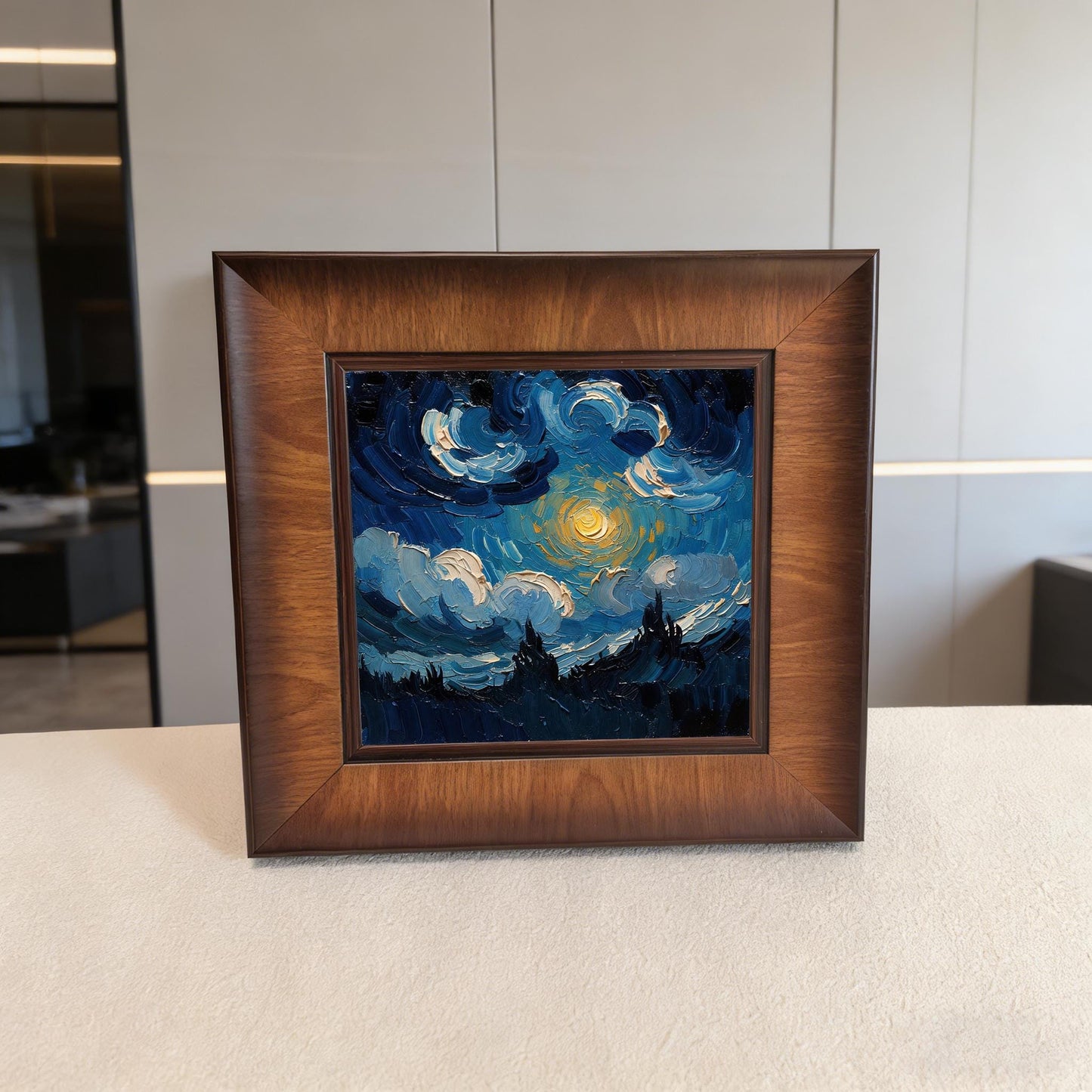 Front view of a square dark wood-framed wall art piece featuring a textured blue and yellow oil painting style, displayed on a clean white surface against a minimalist background.