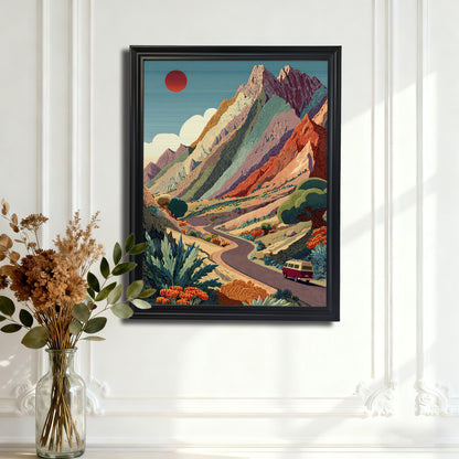 Mountain Road Trip,"Black-framed art print of the vibrant mountain landscape with a winding road, hanging on an ornate white paneled wall.