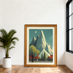 Large, natural wood-framed art print with a minimalist mountain and cyclist design, leaning on a wooden floor against a white wall in a corner with a large black window and a potted palm.
