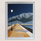 Geometric art print of a wide pier leading to layered mountains under a navy sky, with lighted street lamps, framed in white, hanging on a light textured wall.