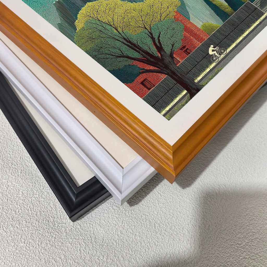 Close-up corner detail of the art print showing three stacked frame options: , white, orange, and black.