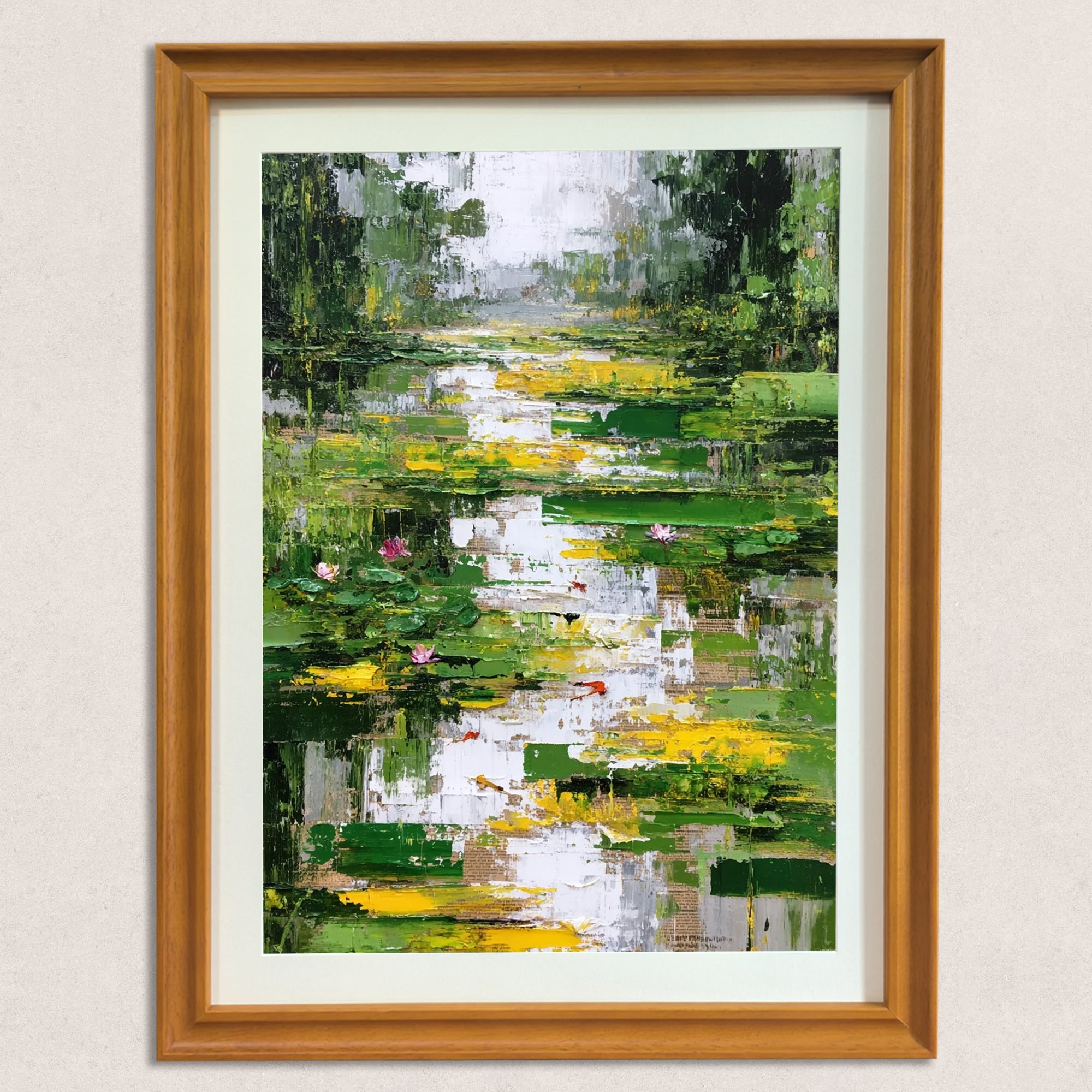 Abstract impressionist painting of a lily pond scene featuring green, yellow, and white colors with pink water lilies, displayed in a simple light brown wooden frame on a textured white wall.