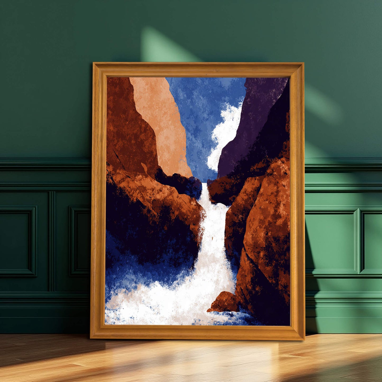Abstract art print of a waterfall in a light wood (natural) frame, leaning against a dark green paneled wall.
