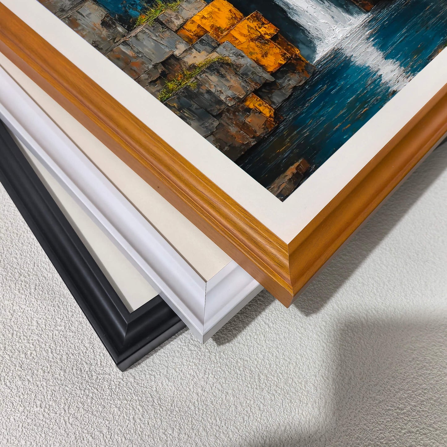 Stacked close-up of multiple frame options (orange, white, black).