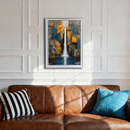 Modern abstract waterfall print in a white wood frame, centered above a rich brown leather couch against a white wainscoting wall.
