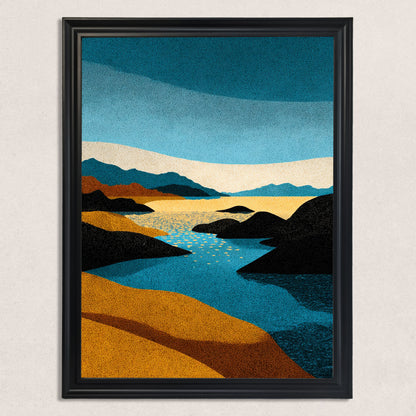 Vertical abstract stippled landscape art print featuring blue sky and water, orange/yellow beach, and black rocks, framed in a classic black wood frame with a cream mat, hanging on a textured white wall.