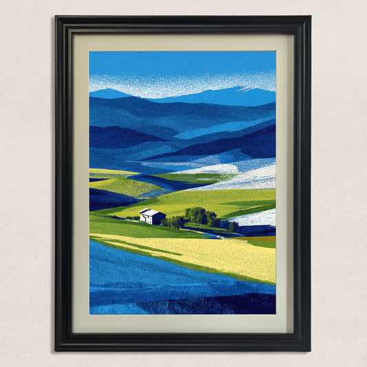 Vertical abstract farm landscape print with intense blue and yellow-green colors, featuring layered hills and a small farmhouse, framed in a classic black wood frame.