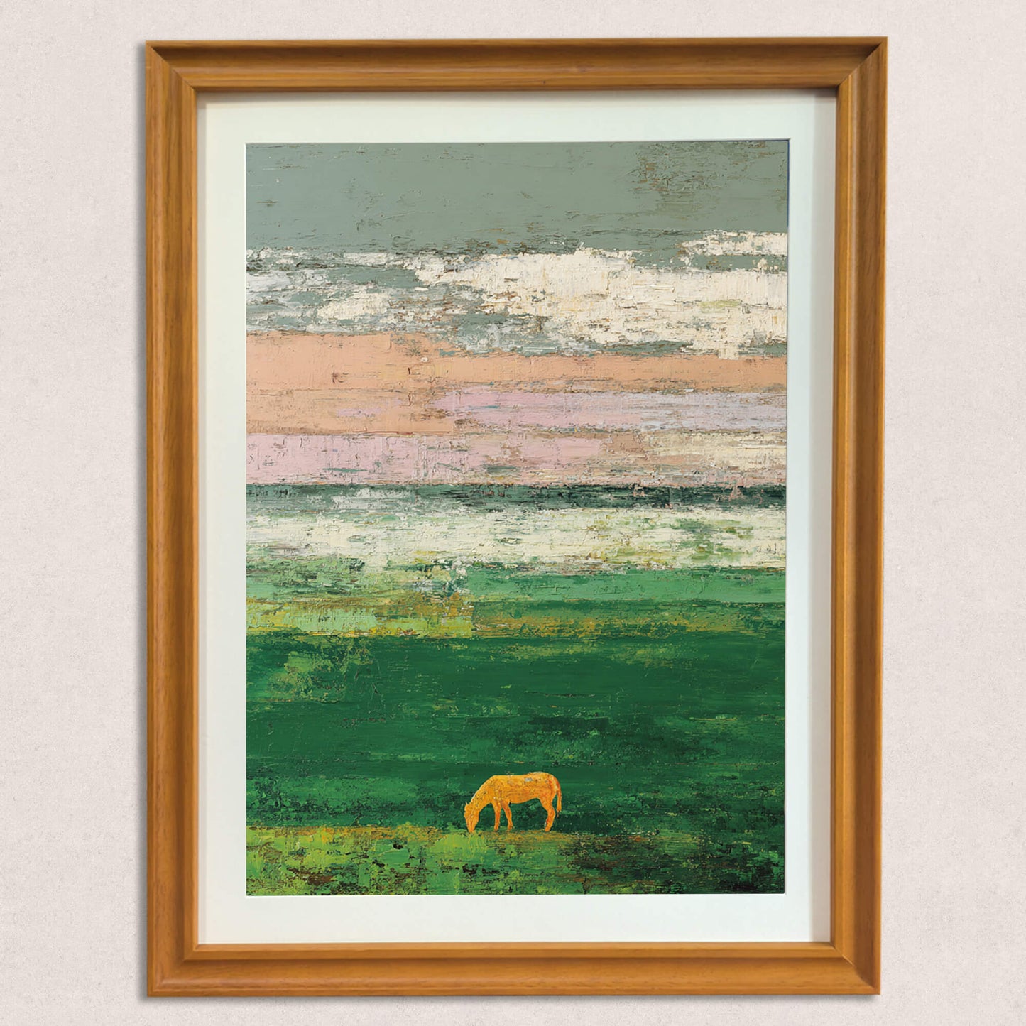 A straight-on view of the framed art print, showing the textured, brushstroke style of the abstract landscape with bands of pink, green, and white, and the clear silhouette of a golden horse in a natural wood frame.