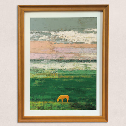 A straight-on view of the framed art print, showing the textured, brushstroke style of the abstract landscape with bands of pink, green, and white, and the clear silhouette of a golden horse in a natural wood frame.