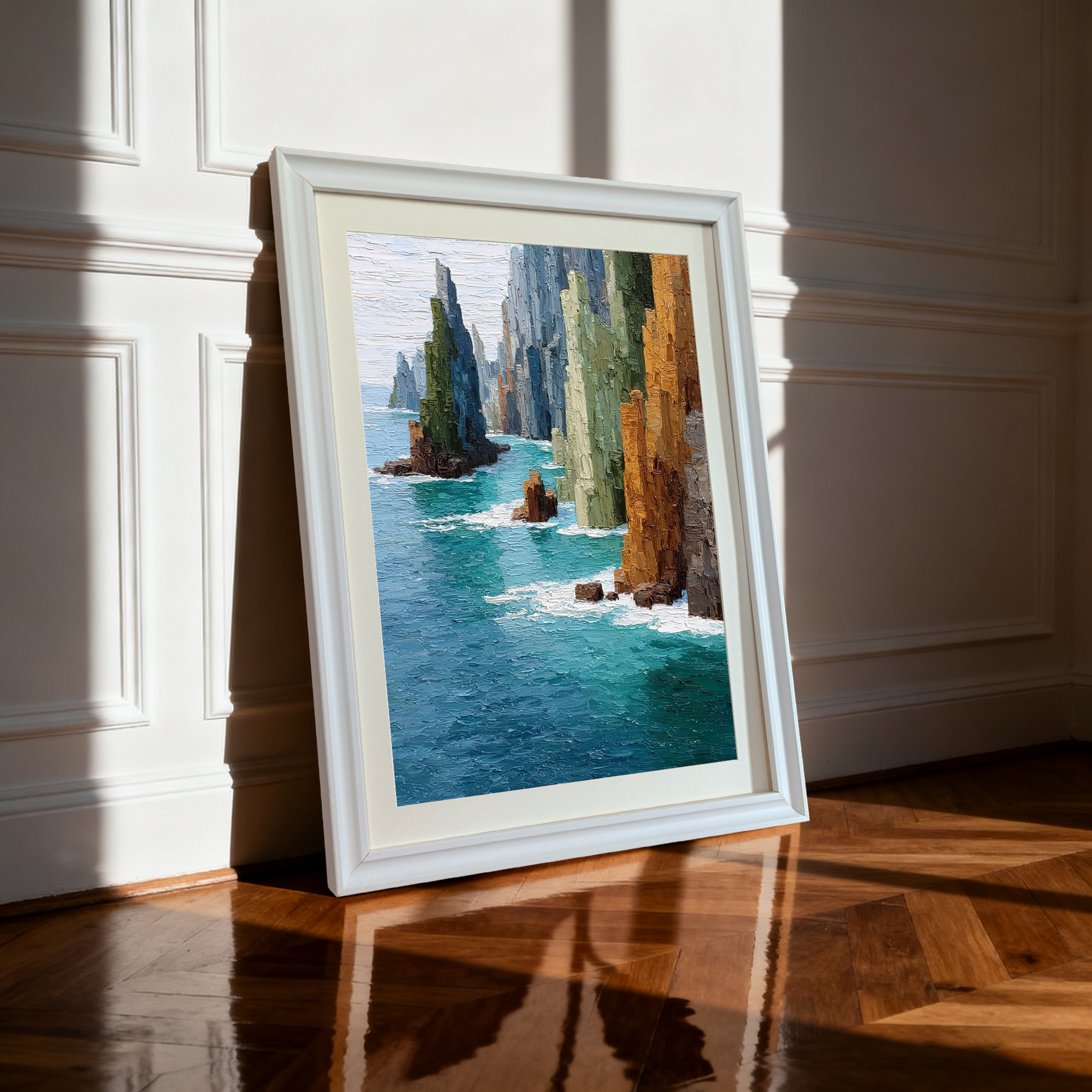 The framed art print in a white wooden frame with a mat, leaning against a white wainscoting wall on a shiny, reflective wooden floor. Bright natural light creates sharp shadows.
