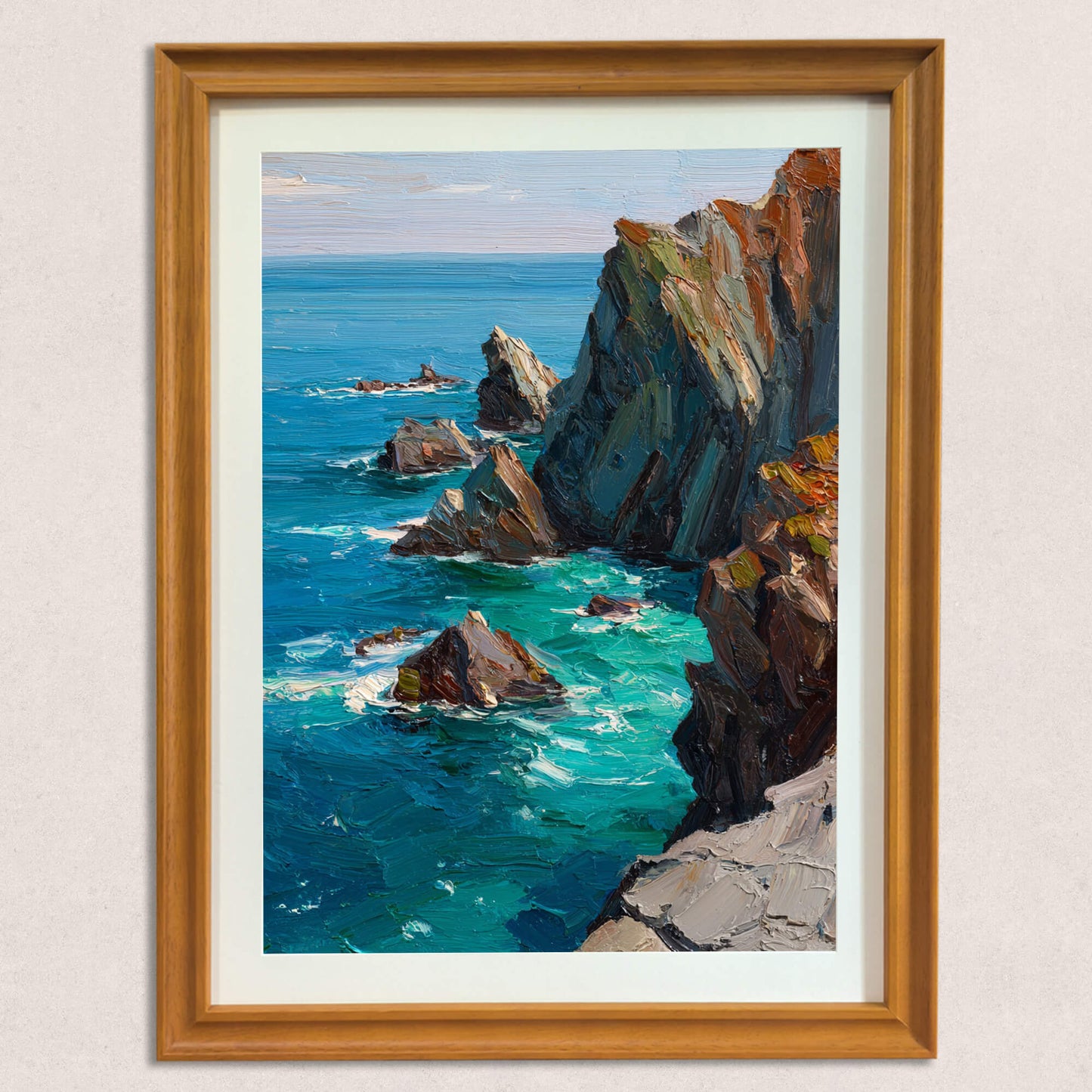 A textured oil painting of rugged coastal cliffs and sea stacks being hit by bright turquoise ocean waves, framed in a warm-toned wooden frame with a mat, hanging on a neutral wall.