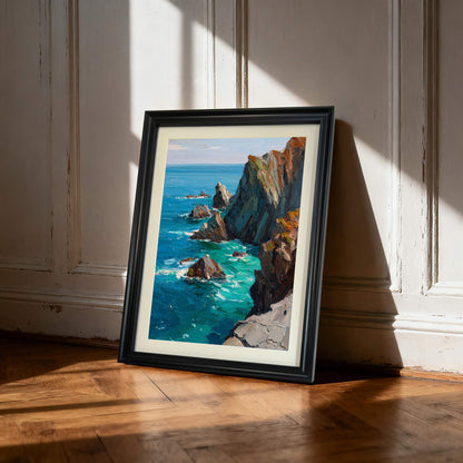 A framed impressionist oil painting of a rugged coastline and bright turquoise sea, leaning against a white paneled wall on a wooden parquet floor in natural sunlight.