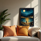 A black-framed art print resting on a white sofa next to orange pillows and a large green plant. Sunlight casts dramatic diagonal shadows across the wall and sofa, highlighting the dark, rich colors of the night scene in the print.