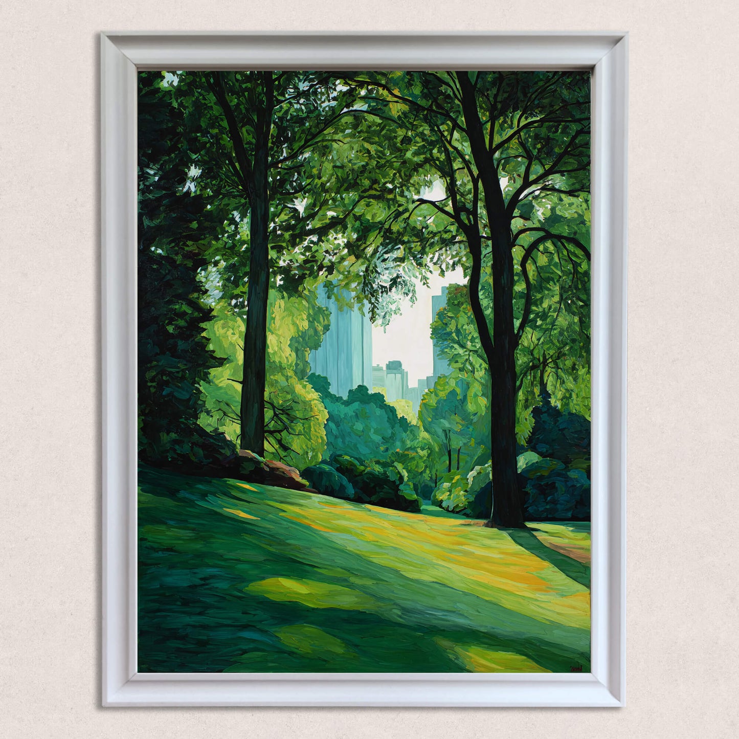 Close-up studio shot of the vibrant oil painting style art print, featuring a sunny green park with large trees and a cityscape skyline visible in the background, framed in a thick white wood frame.
