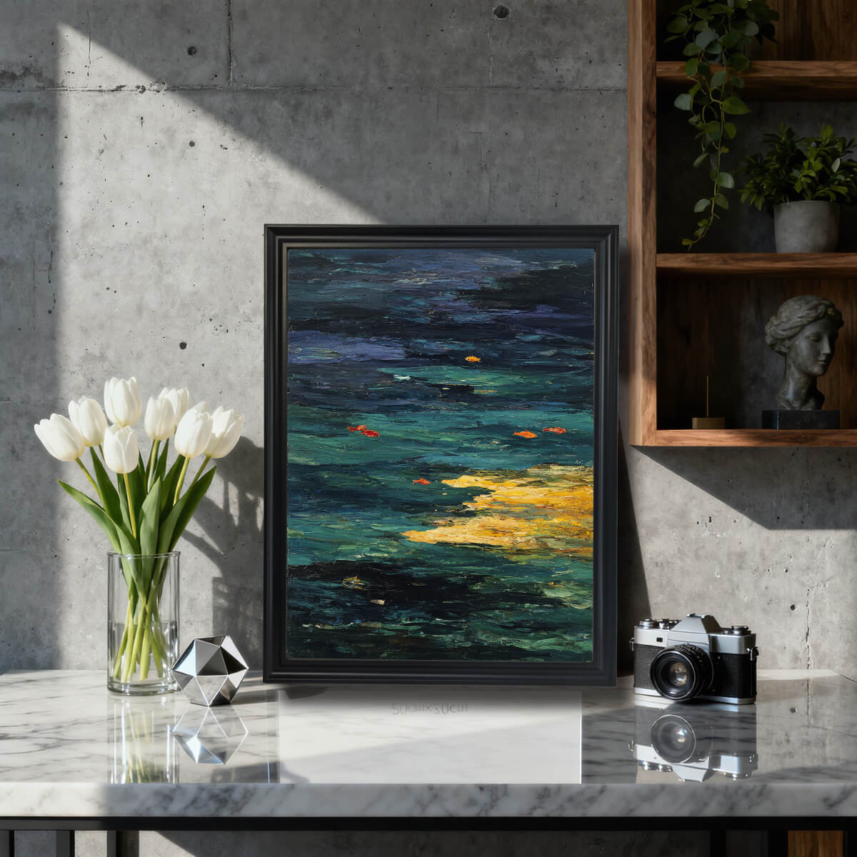 Abstract Goldfish Pond art print in a black wood frame with a mat, sitting on a marble countertop next to white tulips and a vintage camera, styled for modern or industrial decor.