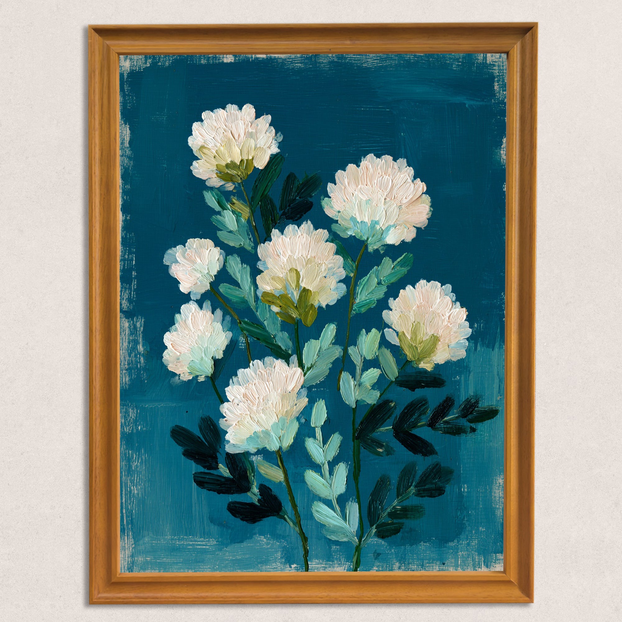 A close-up of the art print in a natural wood-grain frame. The artwork is an abstract bouquet of thick-textured, white circular flowers and stylized green leaves on a vibrant, distressed teal background.