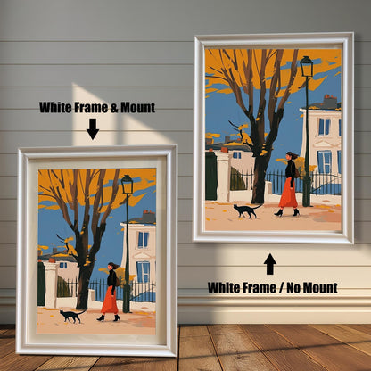 Two framed art prints of a woman and a black cat on a street. The left print has a white frame and a white mat ("mount"), while the right print has a white frame with no mat.