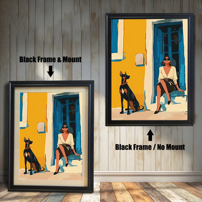 A split image showing two different framing options for the same artwork. On the left, a framed print with a black frame and a white mat (mount) is labeled "Black Frame & Mount." On the right, the same print is shown in a black frame without a mat, labeled "Black Frame / No Mount." Both images are against a rustic wood-paneled wall. The art depicts a woman sitting on a step next to a Doberman dog.