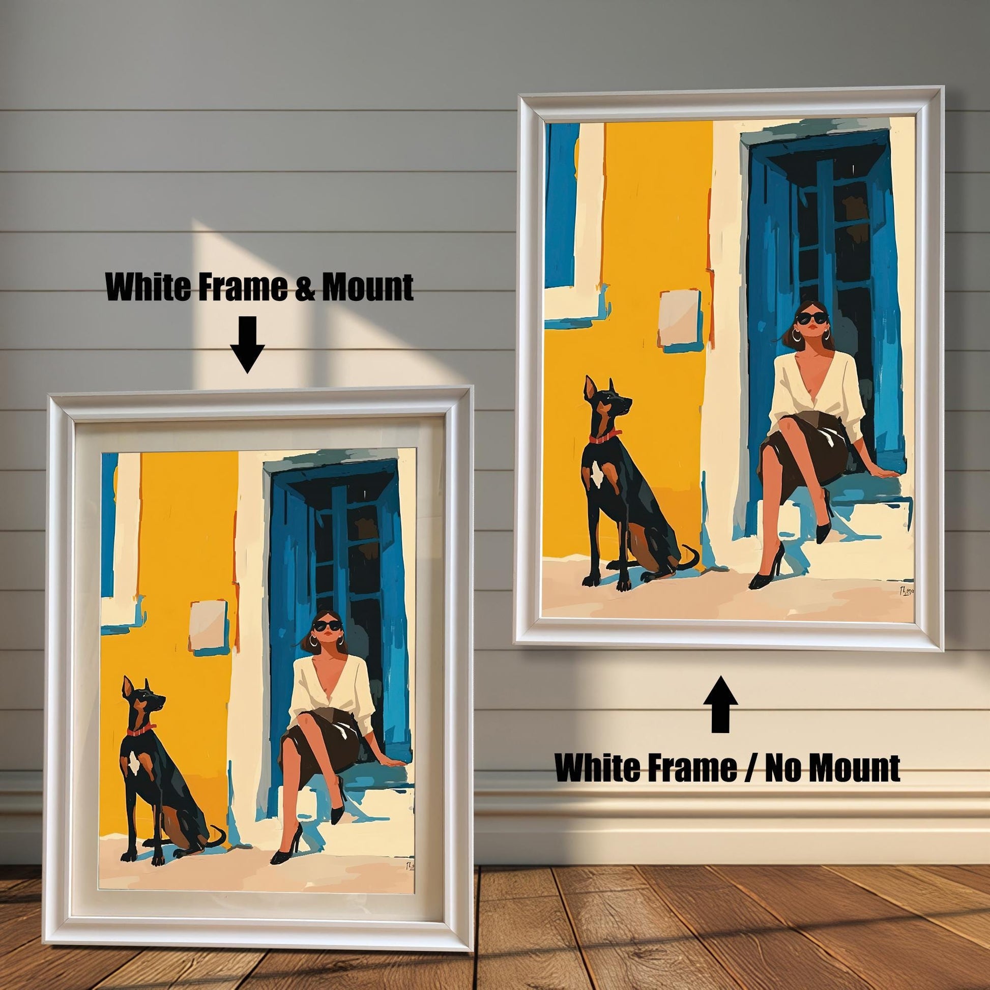 A split image showing two different framing options for the same artwork. On the left, a framed print with a white frame and a white mat (mount) is labeled "White Frame & Mount." On the right, the same print is shown in a white frame without a mat, labeled "White Frame / No Mount." Both images are against a rustic wood-paneled wall. The art depicts a woman sitting on a step next to a Doberman dog.