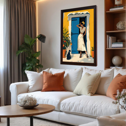 A vertical framed artwork hangs above a white sofa. The artwork depicts a woman in a white outfit with a yellow flower in her hair, standing in a doorway with a bright blue door and a yellow building. A black cat sits nearby. The room has a contemporary design with a plant, a floor lamp, and a bookshelf.