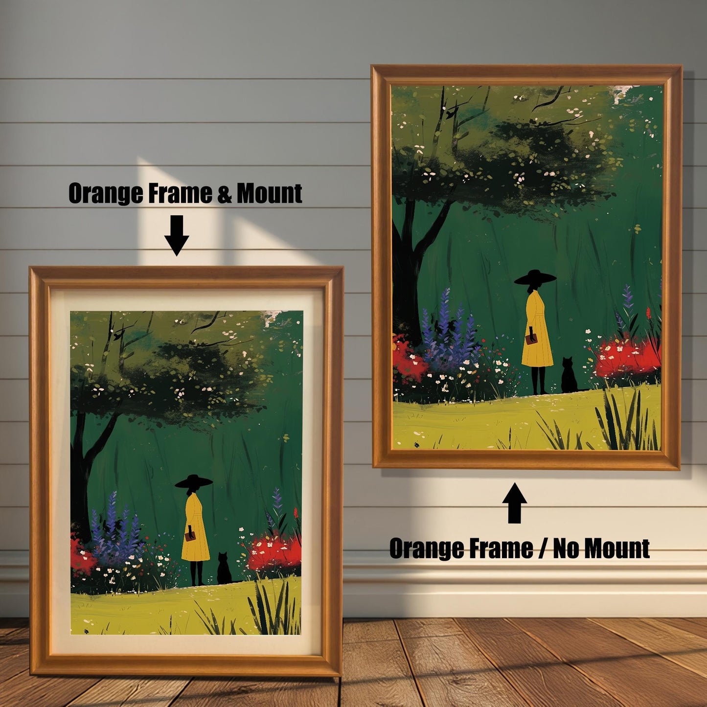 Orange wood framed wall art print of a woman and a black cat in a beautiful garden, offered with and without a matboard mount. The warm orange frame complements the yellow coat in the artwork.