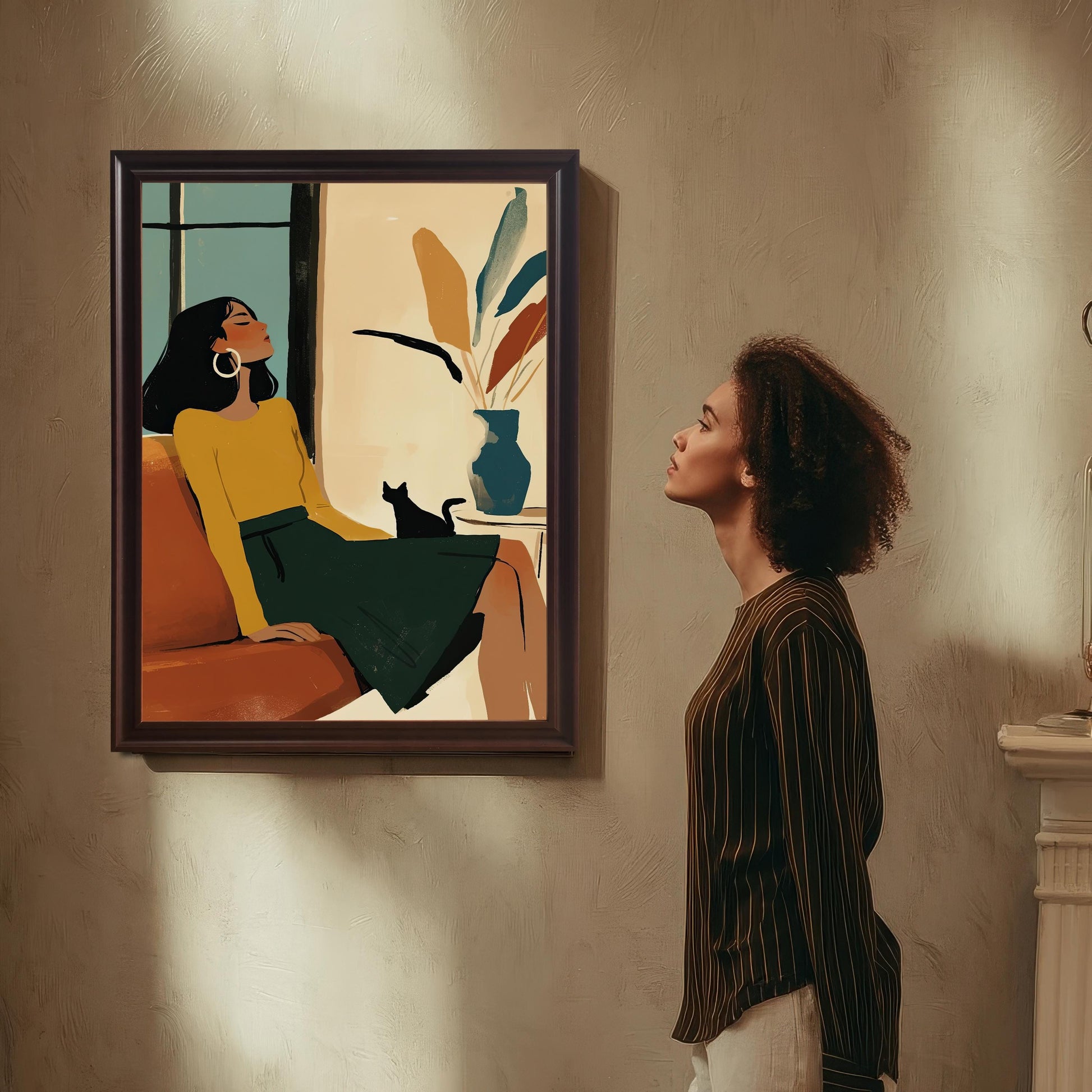 A dark-haired woman in a striped shirt looks up at a framed art print of a woman on a couch. The print is framed in a coffee-colored wood frame.