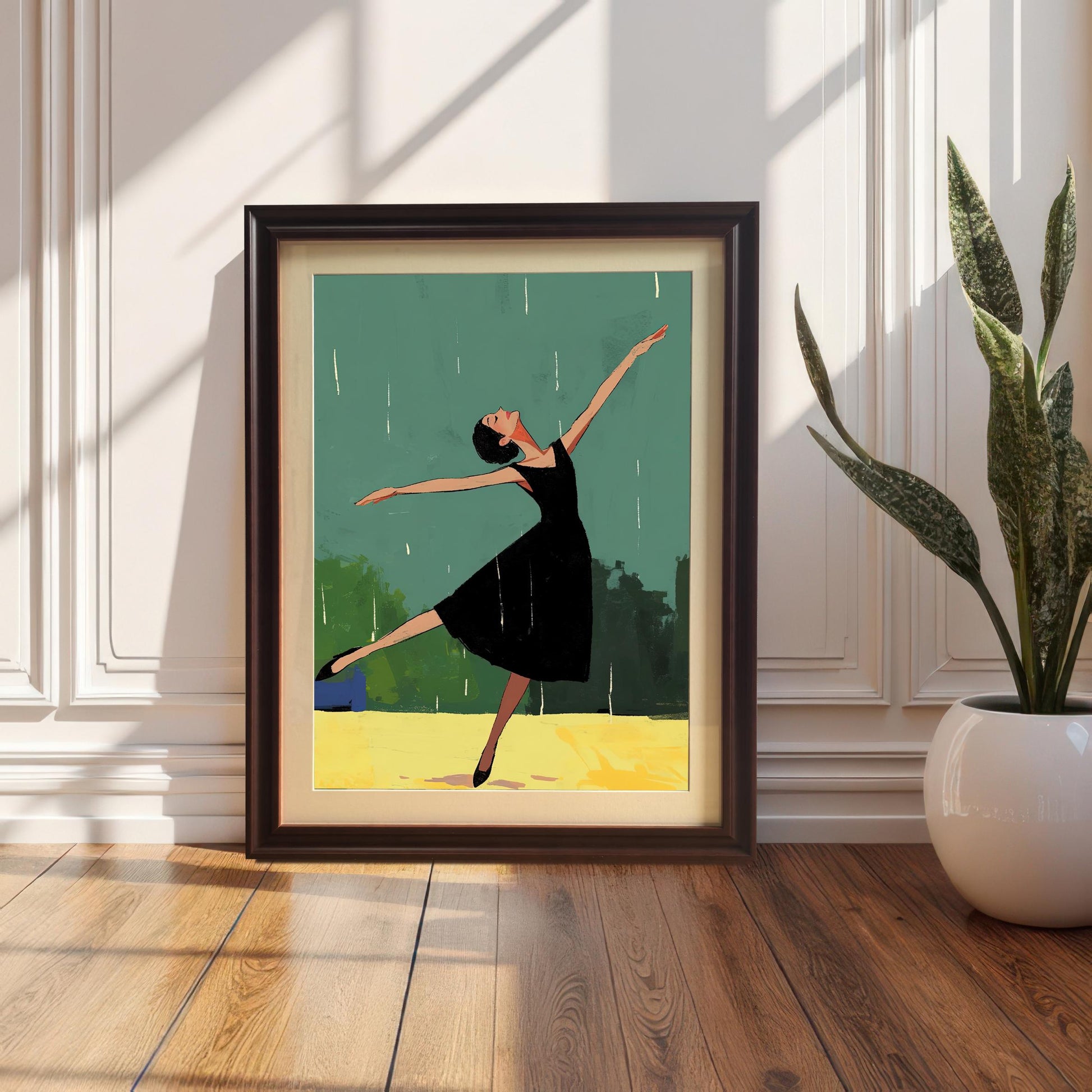 A framed wall art print in a dark coffee-colored frame is leaning against a white wooden wall next to a houseplant.