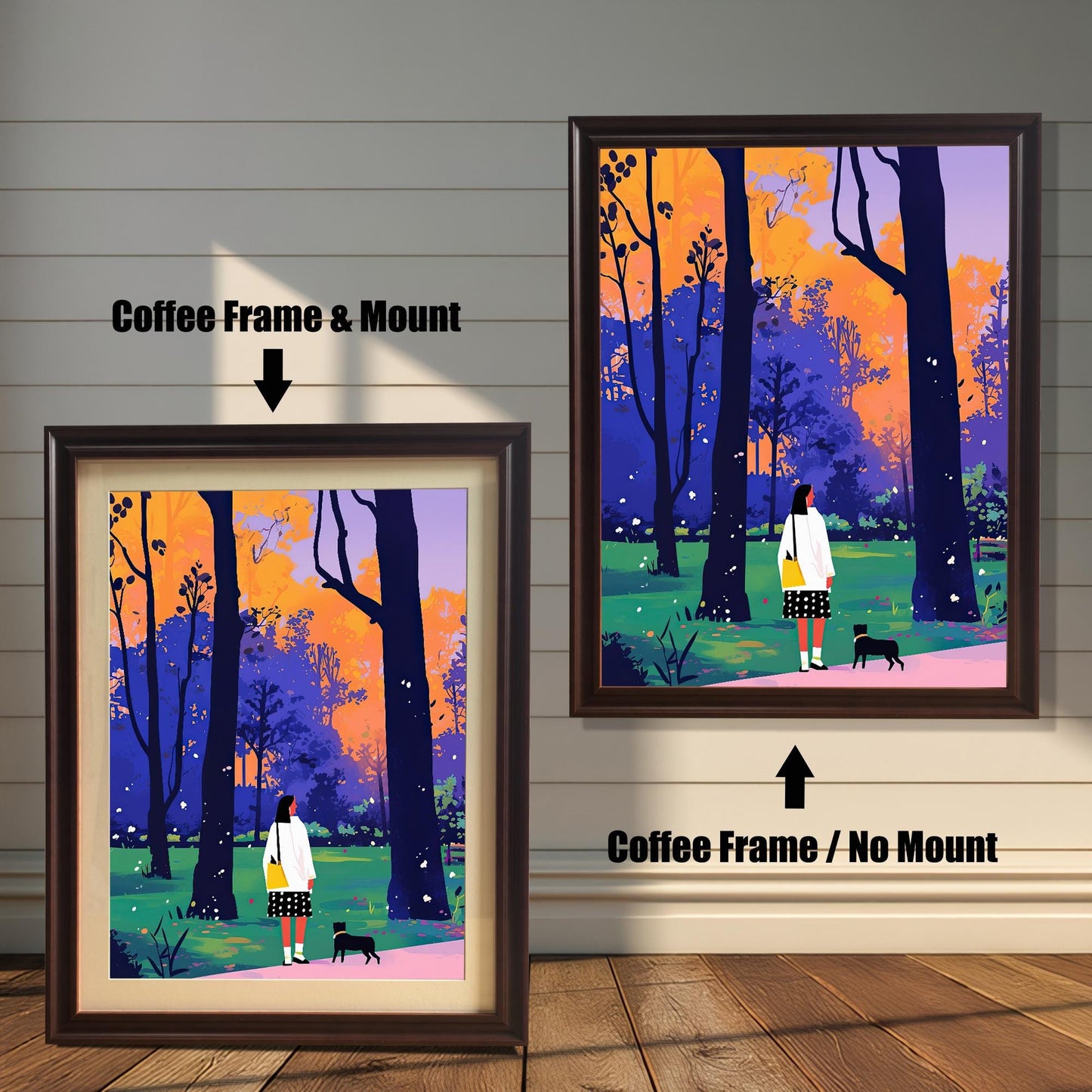 A split image showing two different framing options for the same artwork. On the left, a framed print with a coffee brown frame and a white mat (mount) is labeled "Coffee Frame & Mount." On the right, the same print is shown in a coffee brown frame without a mat, labeled "Coffee Frame / No Mount." Both images are against a rustic wood-paneled wall. The art depicts a woman and a small black dog walking through a park with colorful trees.