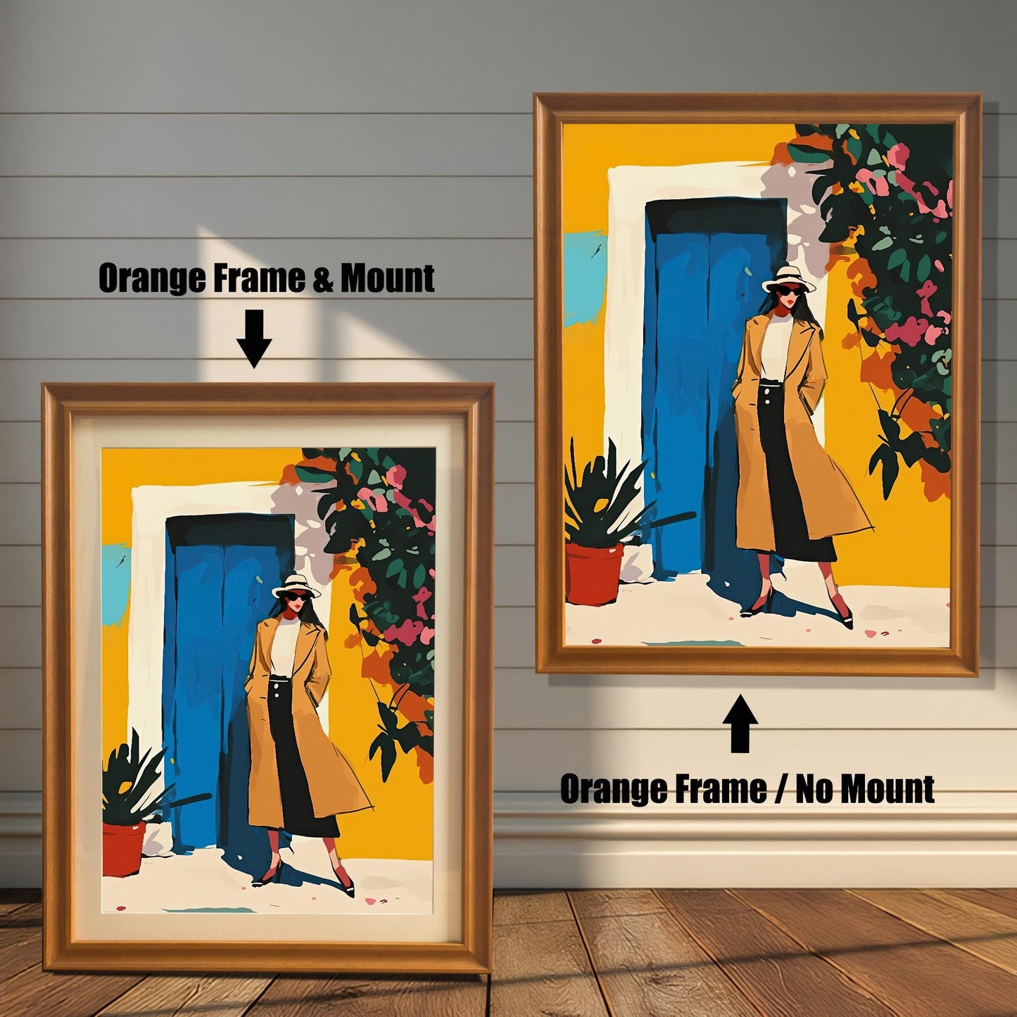 A framed art print is shown in two styles. On the left, a woman in a tan coat stands in front of a yellow wall with a blue door. This print is in an orange-colored frame with a white mount (matting). On the right, the same print is shown in an orange-colored frame without a mount.