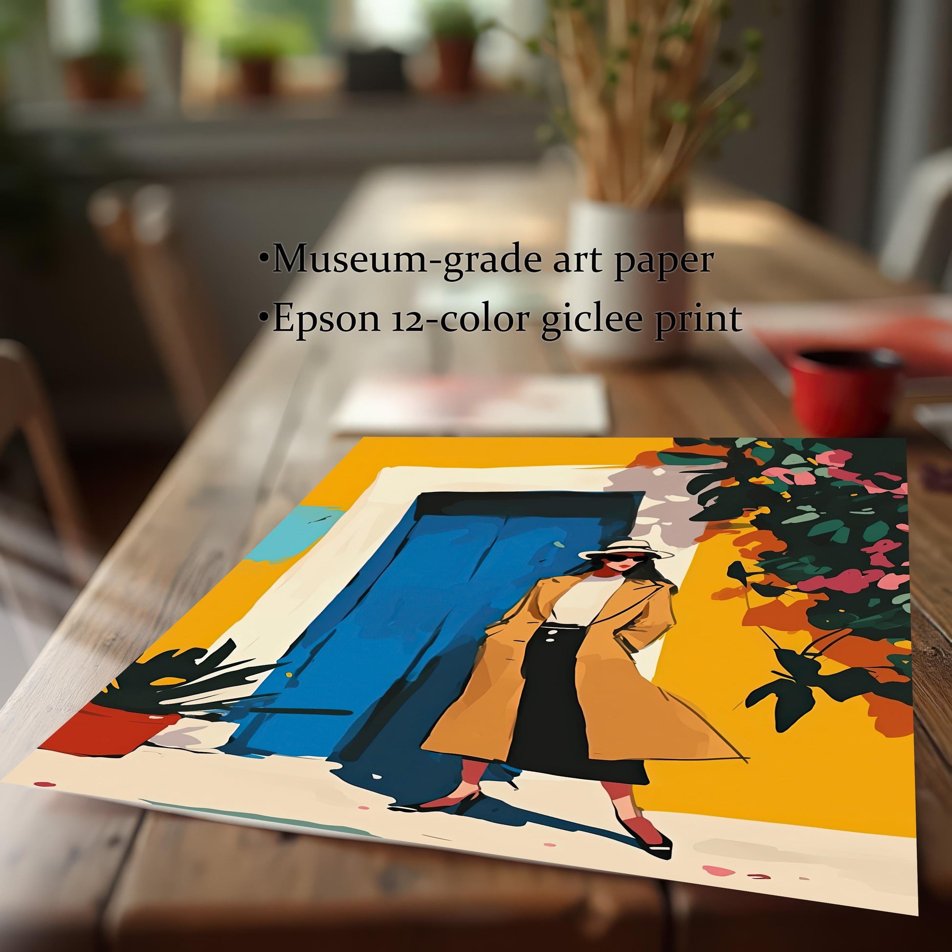 A close-up, angled shot of the art print itself, lying on a wooden table. The image highlights the quality of the print, with text noting "Museum-grade art paper" and "Epson 12-color giclee print."