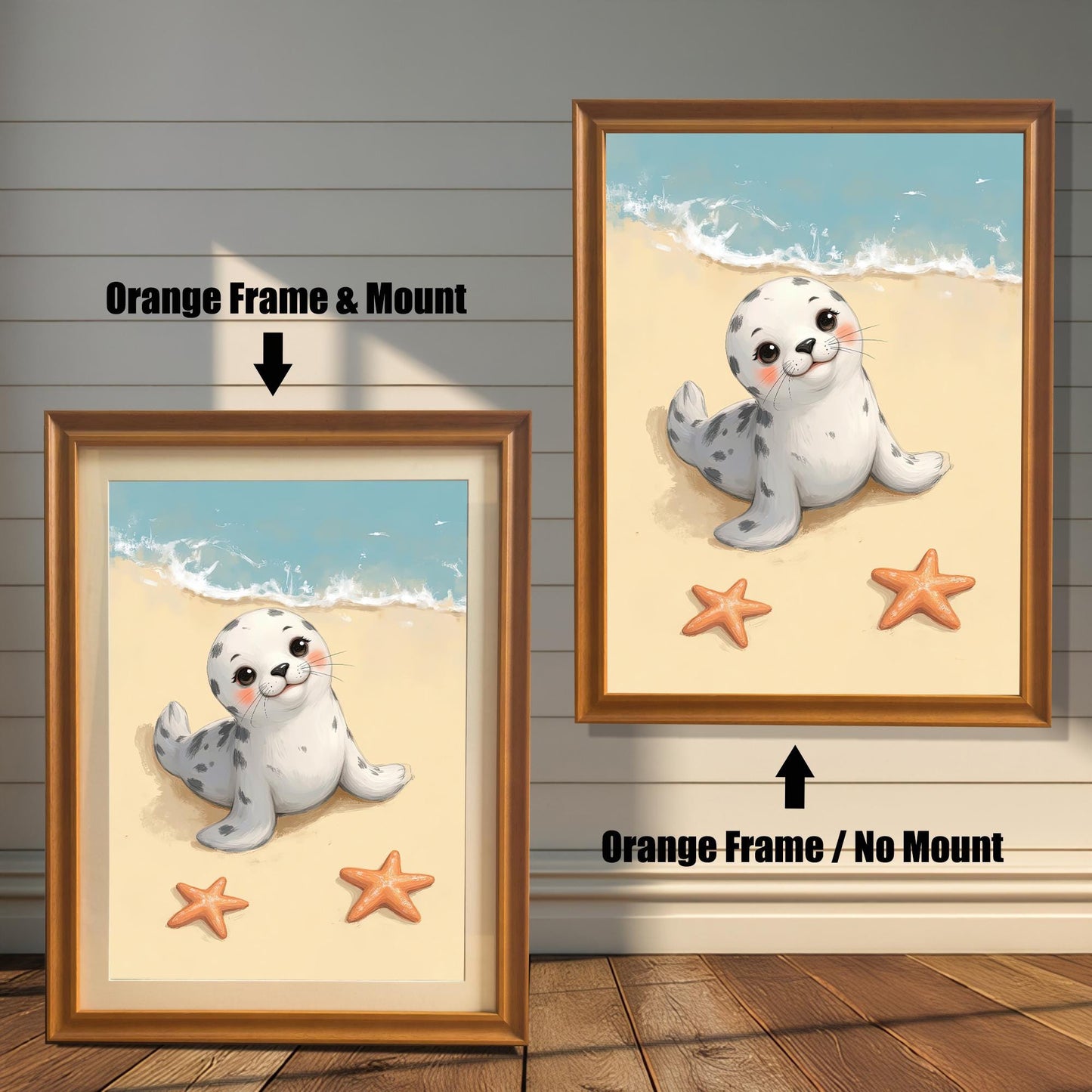 Two framed art prints of a baby seal. The print on the left has an orange frame with a mount, while the one on the right has the same frame without a mount. Text labels describe the "Orange Frame & Mount" and "Orange Frame / No Mount" options.
