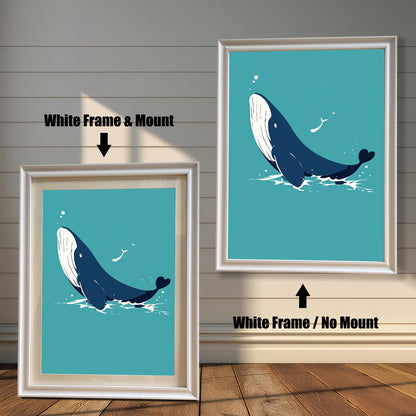 Two framed whale prints. The one on the left has a white frame with a white mount, and the one on the right has a white frame without a mount.