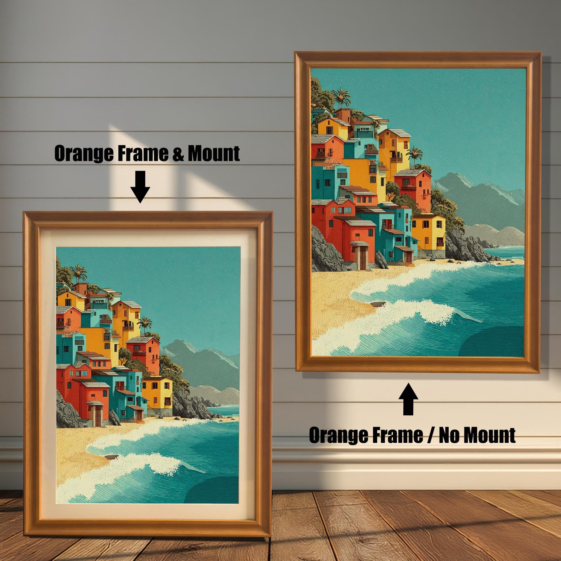 Two framed art prints are shown. The one on the left has an orange-colored frame with a mount, and the one on the right has an orange-colored frame with no mount. The print itself shows colorful houses on a beach.