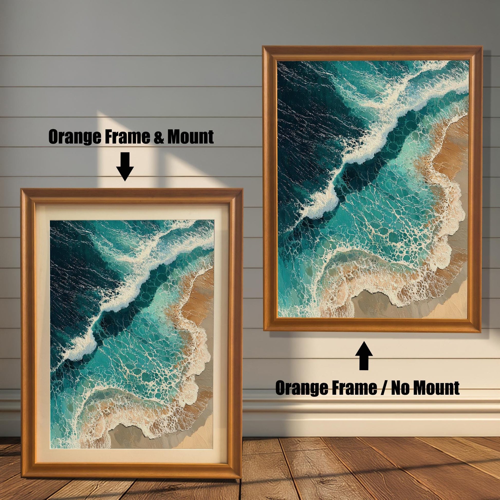 Two framed art prints are shown. The one on the left has an orange-colored frame with a mount, and the one on the right has an orange-colored frame with no mount. The print itself is an aerial view of waves on a beach.