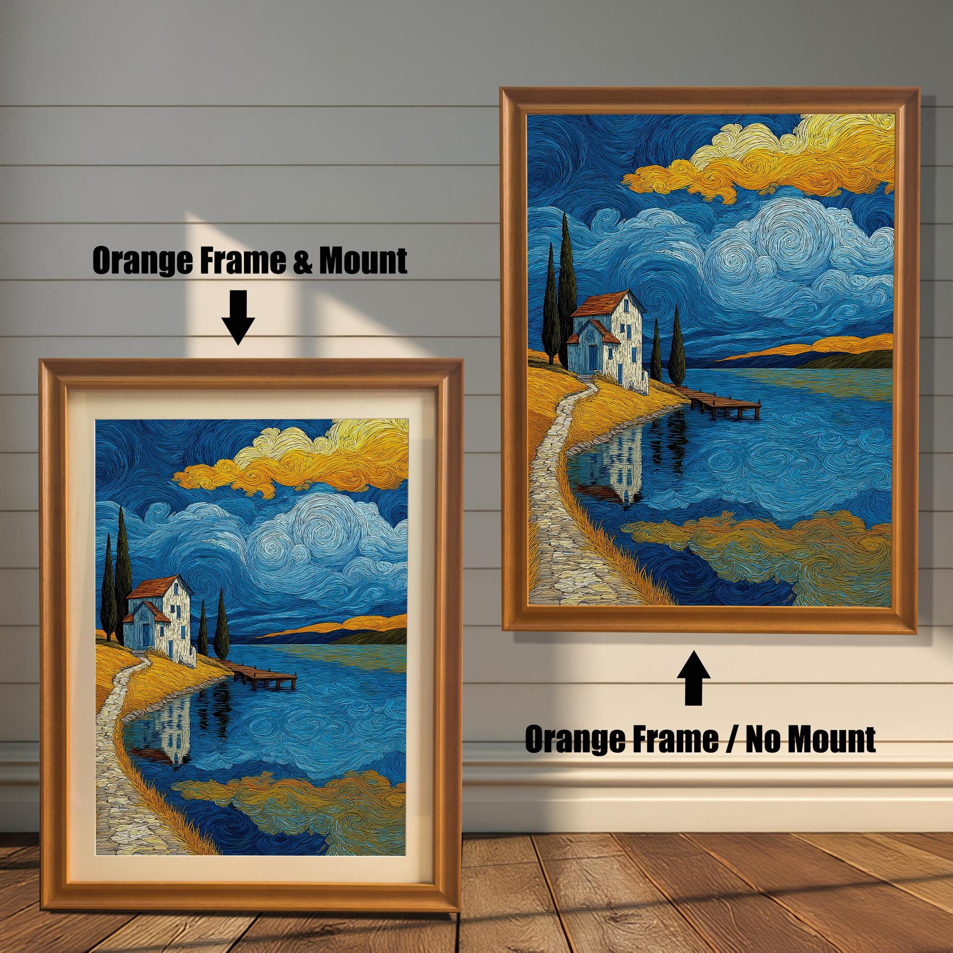 Two framed art prints are shown against a wall with wainscoting. The one on the left has an orange-colored frame with a mount, and the one on the right has an orange-colored frame with no mount. The print itself shows a landscape with a house by a lake under a starry sky.