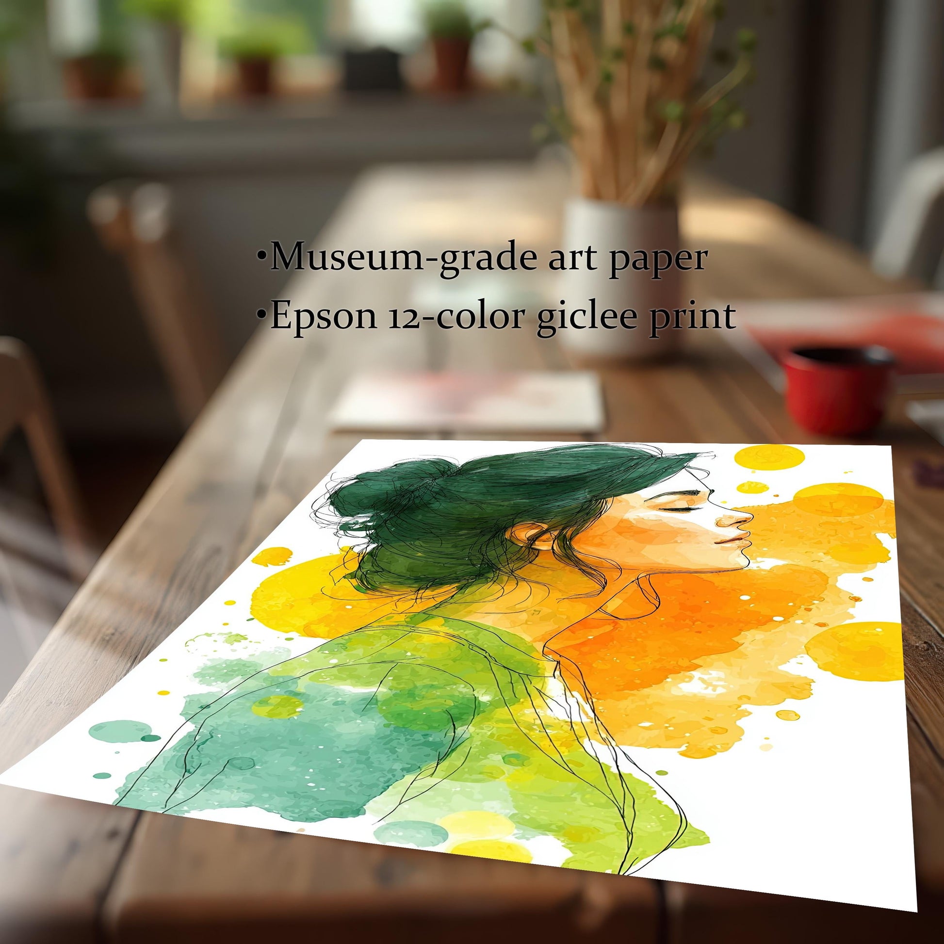 A close-up shot of the unframed watercolor print of a woman, resting on a rustic wooden table. The text highlights "Museum-grade art paper" and "Epson 12-color giclee print."